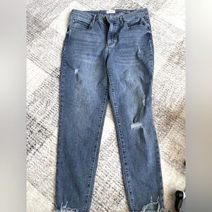 High waisted distressed jeans